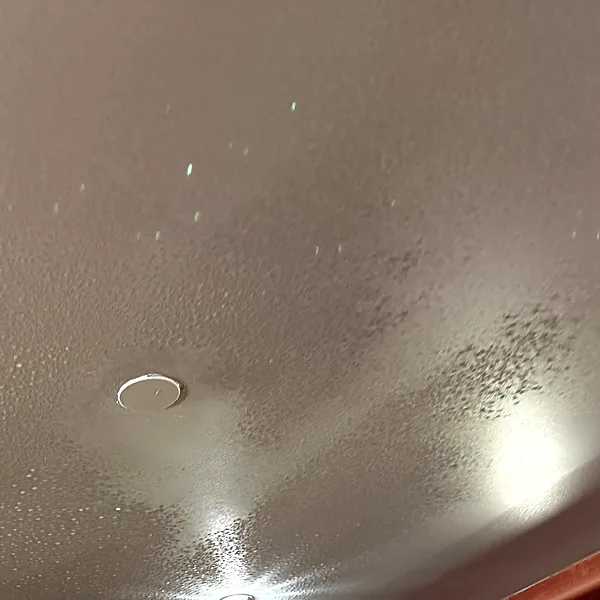 Moisture spots on a ceiling after water damage