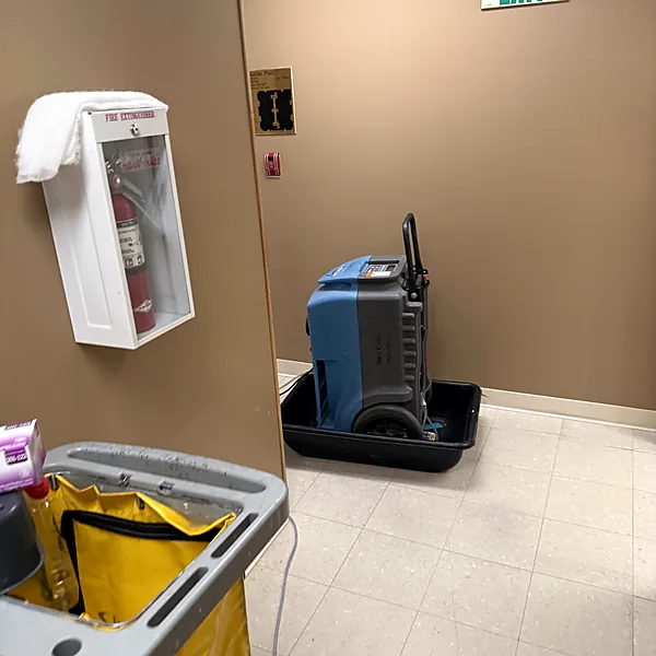 Commercial dehumidifier in a building corridor