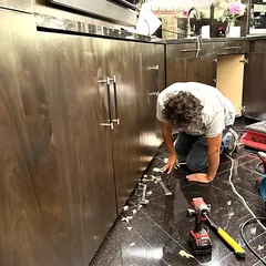Tear-out of water-damaged kitchen flooring